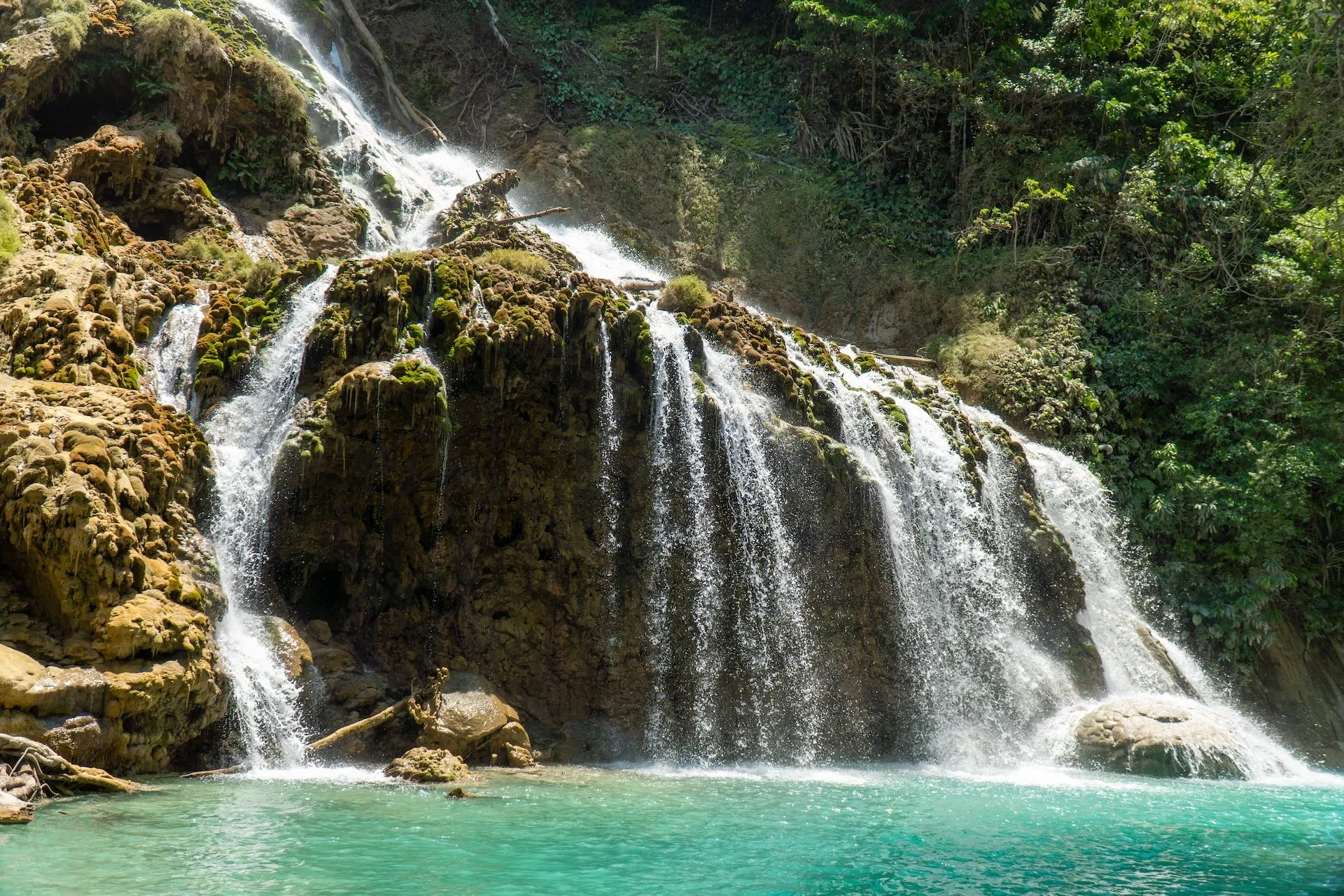 Lapopu waterfall and turquoise pool