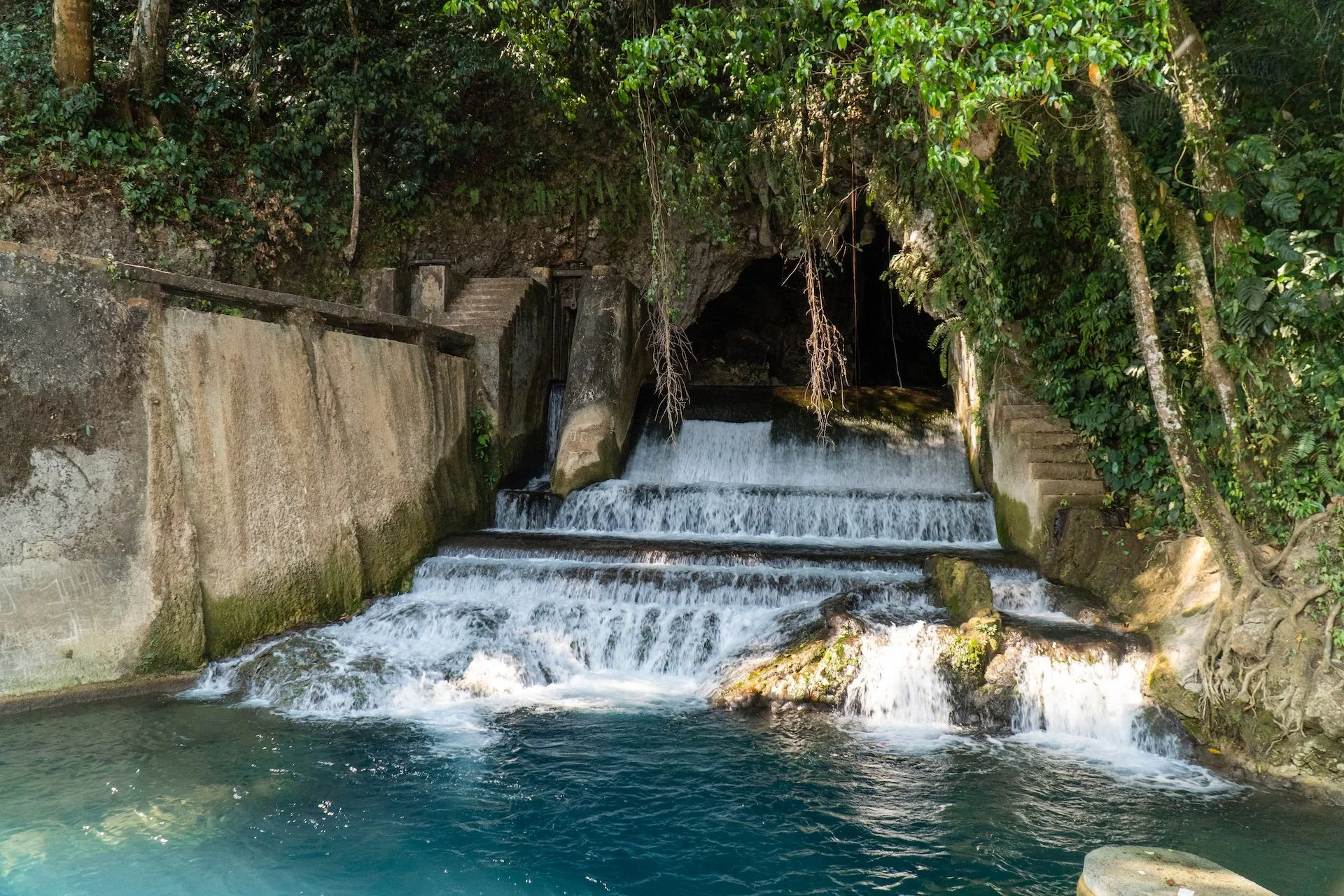Grotto and clear turquoise water near Pantai Kerewe