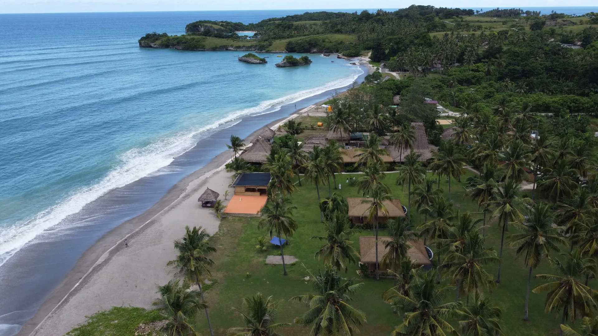 Aerial of Pantai Kerewe, the villas and the bay