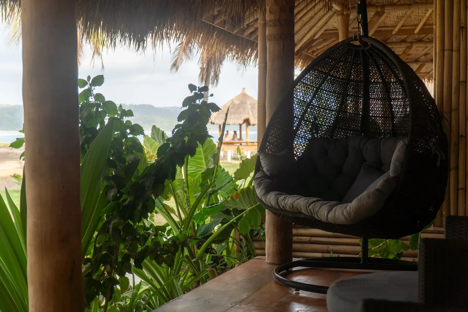 Villa Lima terrace and hanging chair above the bay